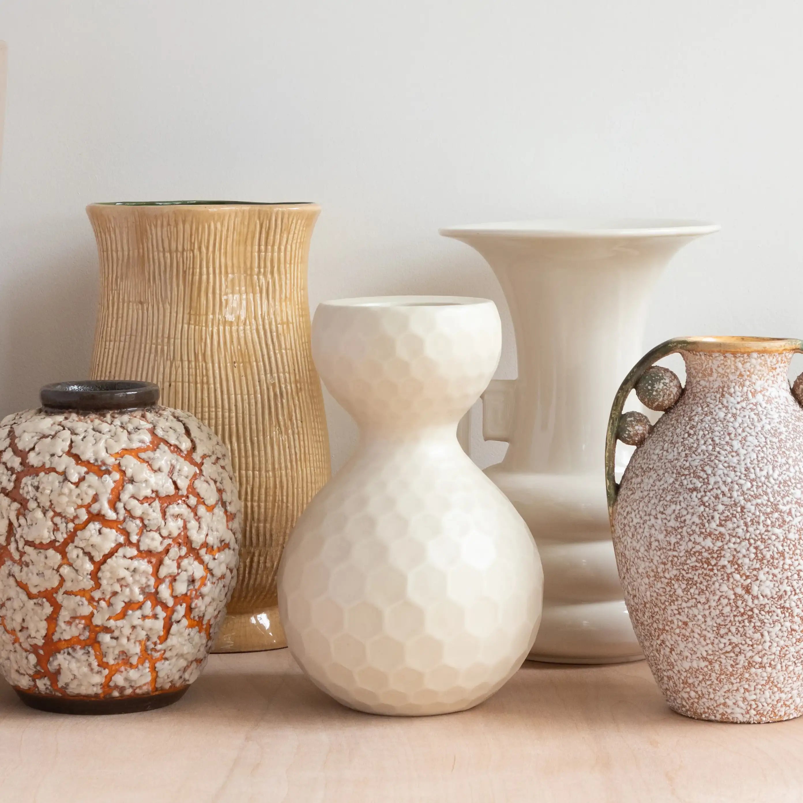 a couple of ceramic vases