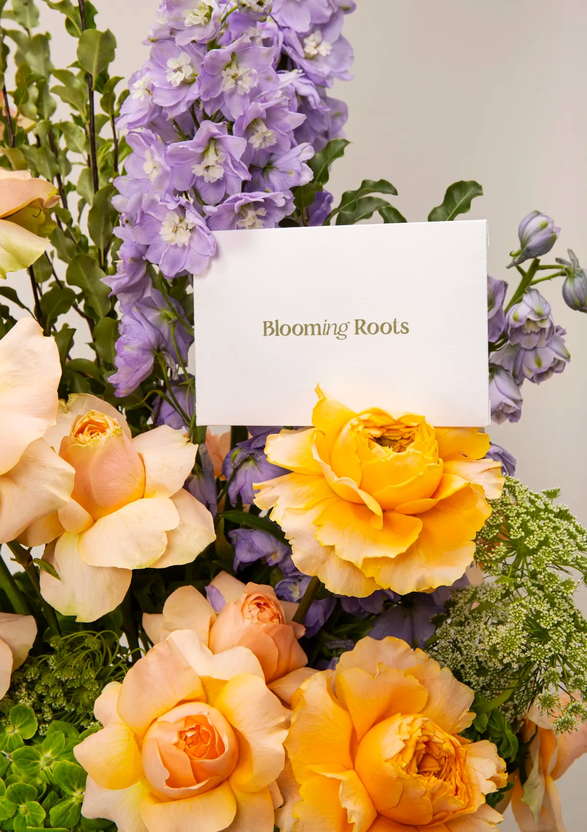 Light Beige Clay Magestic Bloom Vase by Blooming Roots with a greeting card that has a logo on it.